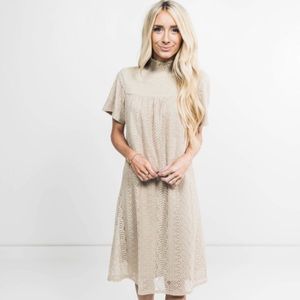 Short sleeved, high neck lace dress